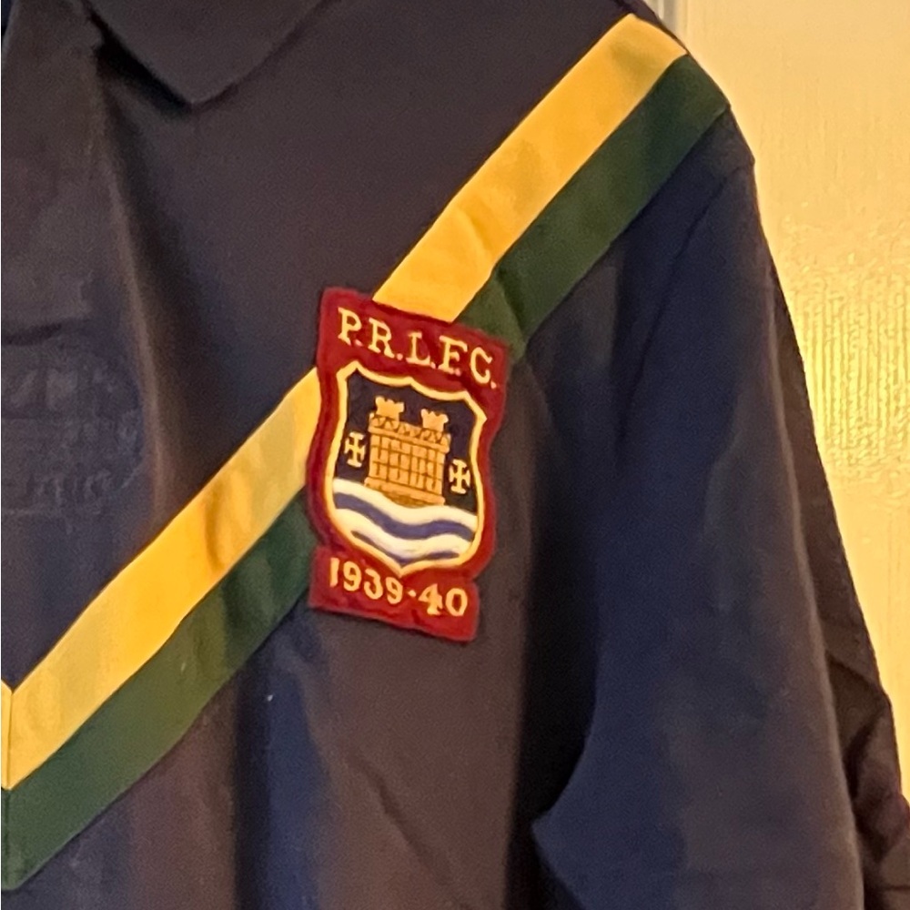 Navy Blue Polo with Crest Patch